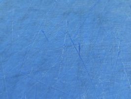 Schadstellen auf einer PE-500 Schneideplatte vor der Bearbeitung